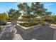 Stone gazebo with seating and landscaping at 2365 Boretto St, Henderson, NV 89044