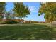 Expansive green lawn area with mature trees at 2365 Boretto St, Henderson, NV 89044