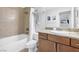 Clean bathroom with tub, shower, and granite vanity at 4200 S Valley View Blvd # 1083, Las Vegas, NV 89103