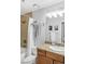 Clean bathroom with tub, shower, and granite vanity at 4200 S Valley View Blvd # 1083, Las Vegas, NV 89103