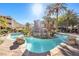 Inviting pool area with a rock waterfall feature at 4200 S Valley View Blvd # 1083, Las Vegas, NV 89103