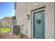 Teal front door and walkway leading to a private backyard with hammock at 4278 Lemay St # 2, Las Vegas, NV 89115