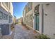 Modern building exterior with a private walkway and well-maintained landscaping at 4278 Lemay St # 2, Las Vegas, NV 89115