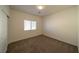 Simple bedroom with double door closet and window at 4654 Stuttgart St, Las Vegas, NV 89147