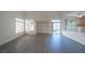 Bright living room with hardwood floors and sliding glass door to backyard at 4654 Stuttgart St, Las Vegas, NV 89147