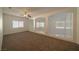 Spacious loft area with carpeting and multiple windows at 4654 Stuttgart St, Las Vegas, NV 89147