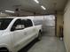 Spacious garage with insulated door and ample space for parking and storage at 4694 E Lucera Ct, Pahrump, NV 89061