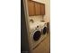 Laundry room with washer, dryer, and cabinets at 4694 E Lucera Ct, Pahrump, NV 89061