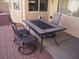 Patio furniture with table and chairs on brick patio at 4694 E Lucera Ct, Pahrump, NV 89061