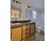 Modern bathroom with double vanity, bathtub, and walk-in shower at 4823 Jubilee Diamond Ct, Las Vegas, NV 89139