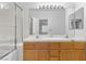 Clean bathroom with double vanity and shower/tub combo at 5155 W Tropicana Ave # 2123, Las Vegas, NV 89103