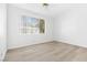 Spacious bedroom with large window and laminate flooring at 5155 W Tropicana Ave # 2123, Las Vegas, NV 89103