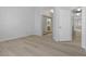 Bright bedroom with wood-look floors and mirrored closet at 5155 W Tropicana Ave # 2123, Las Vegas, NV 89103