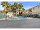 Relaxing kidney-shaped pool and spa in a gated community at 5155 W Tropicana Ave # 2123, Las Vegas, NV 89103