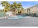 Inviting kidney-shaped community pool with a patio area at 5155 W Tropicana Ave # 2123, Las Vegas, NV 89103