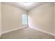 Bright bedroom with neutral walls and carpet at 5306 Falling Petals Dr, North Las Vegas, NV 89031