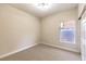 Bedroom with carpet flooring and sliding closet doors at 5306 Falling Petals Dr, North Las Vegas, NV 89031