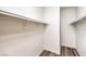 Large walk-in closet with double hanging rods and shelving at 5306 Falling Petals Dr, North Las Vegas, NV 89031