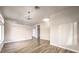 Spacious living area featuring hardwood floors and recessed lighting at 5306 Falling Petals Dr, North Las Vegas, NV 89031