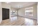 Bright and airy living room with hardwood floors and lots of natural light at 5306 Falling Petals Dr, North Las Vegas, NV 89031