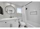 Modern bathroom with white subway tile and a white vanity at 5420 Doe Ave, Las Vegas, NV 89146