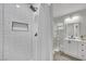 Clean bathroom with white subway tile shower and modern vanity at 5420 Doe Ave, Las Vegas, NV 89146