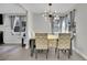 Charming dining room with gray chairs and a farmhouse-style table at 5420 Doe Ave, Las Vegas, NV 89146