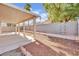 Covered patio and spacious backyard with gravel landscaping at 5533 Ramirez St, North Las Vegas, NV 89031