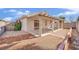 Home features a covered patio and a large backyard at 5533 Ramirez St, North Las Vegas, NV 89031