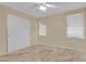 Spacious bedroom with double door closet and tile flooring at 5533 Ramirez St, North Las Vegas, NV 89031