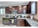 Kitchen with stainless steel appliances and granite countertops at 5658 Adobe Jack St, North Las Vegas, NV 89031