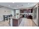 Modern kitchen with stainless steel appliances and granite countertops at 5658 Adobe Jack St, North Las Vegas, NV 89031