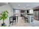 Modern kitchen with stainless steel appliances and granite countertops at 5658 Adobe Jack St, North Las Vegas, NV 89031