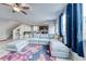 Comfortable living room with a sectional sofa and colorful rug at 5658 Adobe Jack St, North Las Vegas, NV 89031