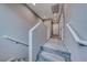 Upper floor view of carpeted stairs and hallway at 5658 Adobe Jack St, North Las Vegas, NV 89031