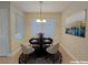 Charming dining area with a round table, four chairs, and stylish decor at 5710 Tropicana Ave # 1063, Las Vegas, NV 89122