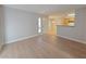 Light-filled living room showcasing wood-look floors and open layout at 5710 Tropicana Ave # 1063, Las Vegas, NV 89122