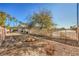 Spacious backyard with gravel landscaping and a gated entrance at 5744 Serenity Haven St, North Las Vegas, NV 89081