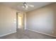 Bedroom with ceiling fan and view to hallway at 5744 Serenity Haven St, North Las Vegas, NV 89081