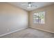 Well-lit bedroom featuring a window at 5744 Serenity Haven St, North Las Vegas, NV 89081