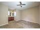 Bright bedroom with ceiling fan and neutral walls at 5744 Serenity Haven St, North Las Vegas, NV 89081