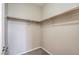 Spacious walk-in closet with ample shelving at 5744 Serenity Haven St, North Las Vegas, NV 89081