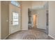 Bright entryway with tile flooring and access to other rooms at 5744 Serenity Haven St, North Las Vegas, NV 89081