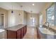 Kitchen boasts an island, ample counter space, and a breakfast nook at 5744 Serenity Haven St, North Las Vegas, NV 89081