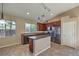 Modern kitchen with stainless steel appliances and an island at 5744 Serenity Haven St, North Las Vegas, NV 89081