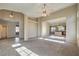 Open living room with high ceilings, view to kitchen at 5744 Serenity Haven St, North Las Vegas, NV 89081