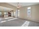 Open living room with high ceilings, view to kitchen at 5744 Serenity Haven St, North Las Vegas, NV 89081