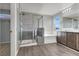 Bathroom with soaking tub, walk-in shower, and double vanity at 5921 Roaring Canyon Ct, Las Vegas, NV 89139