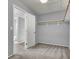 Spacious walk-in closet with carpeted flooring and shelving at 5921 Roaring Canyon Ct, Las Vegas, NV 89139