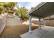 Covered patio and gravel backyard with block wall at 5934 Clear Valley Ave, Las Vegas, NV 89142